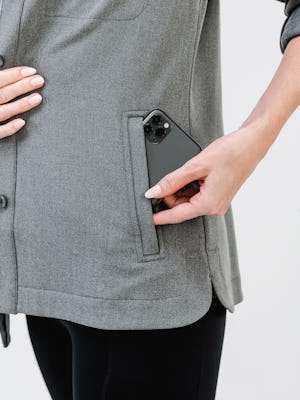 model wearing womens fusion overshirt medium grey heather front pocket zoom with iphone