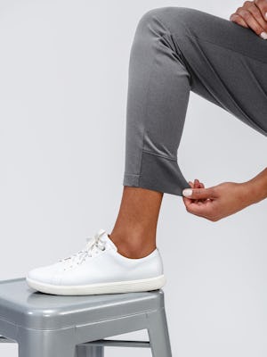 Women's Slate Grey Kinetic Pull On Pant on model adjusting cuff