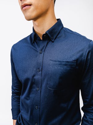 model wearing mens hybrid button down shirt navy zoom collar
