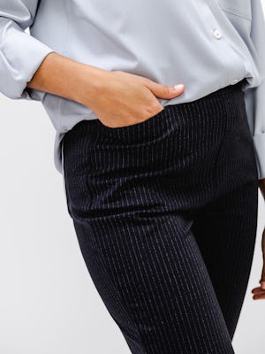 Close up of hand in pocket on Women's Navy Pinstripe Fusion Straight Leg Pant on model