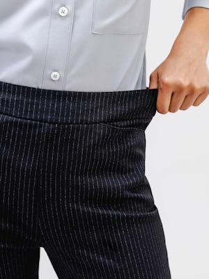 Close up of stretch waistband of Women's Navy Pinstripe Fusion Straight Leg Pant on model