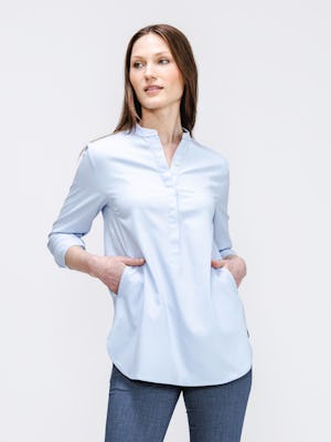 model wearing womens aero zero band collar tunic chambray blue