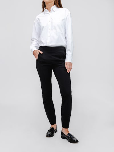 Black Women's Kinetic Pintuck pant on model with hand in pocket