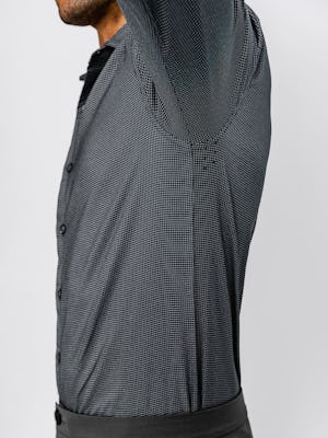 Close up of Men's Aero Zero Dress Shirt Charcoal Mini Grid on model raising arm