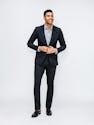 Men's Dark Charcoal Velocity Suit on model adjusting button