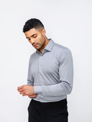 Men's New Grey Oxford Apollo Dress Shirt on model adjusting cuff