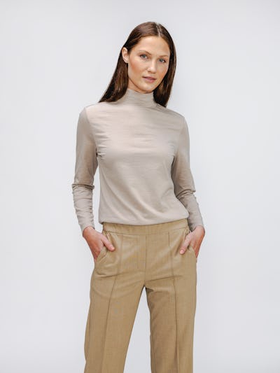 Women's Taupe Composite Merino Mock Neck and Sand Kinetic Corduroy 5-Pocket Pant on model