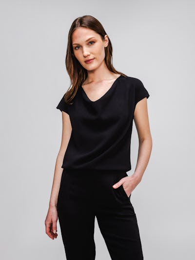 model wearing womens Swift Satin Reversible Blouse black in studio
