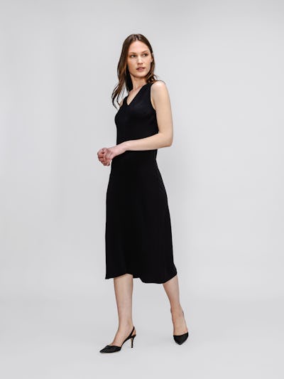 model wearing womens Swift Satin Reversible Dress black in studio