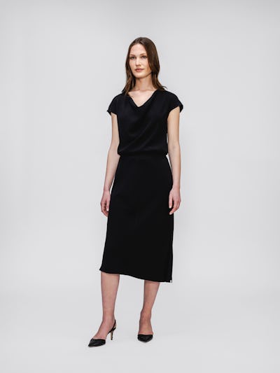 model wearing womens Swift Satin Reversible Skirt black on model in studio