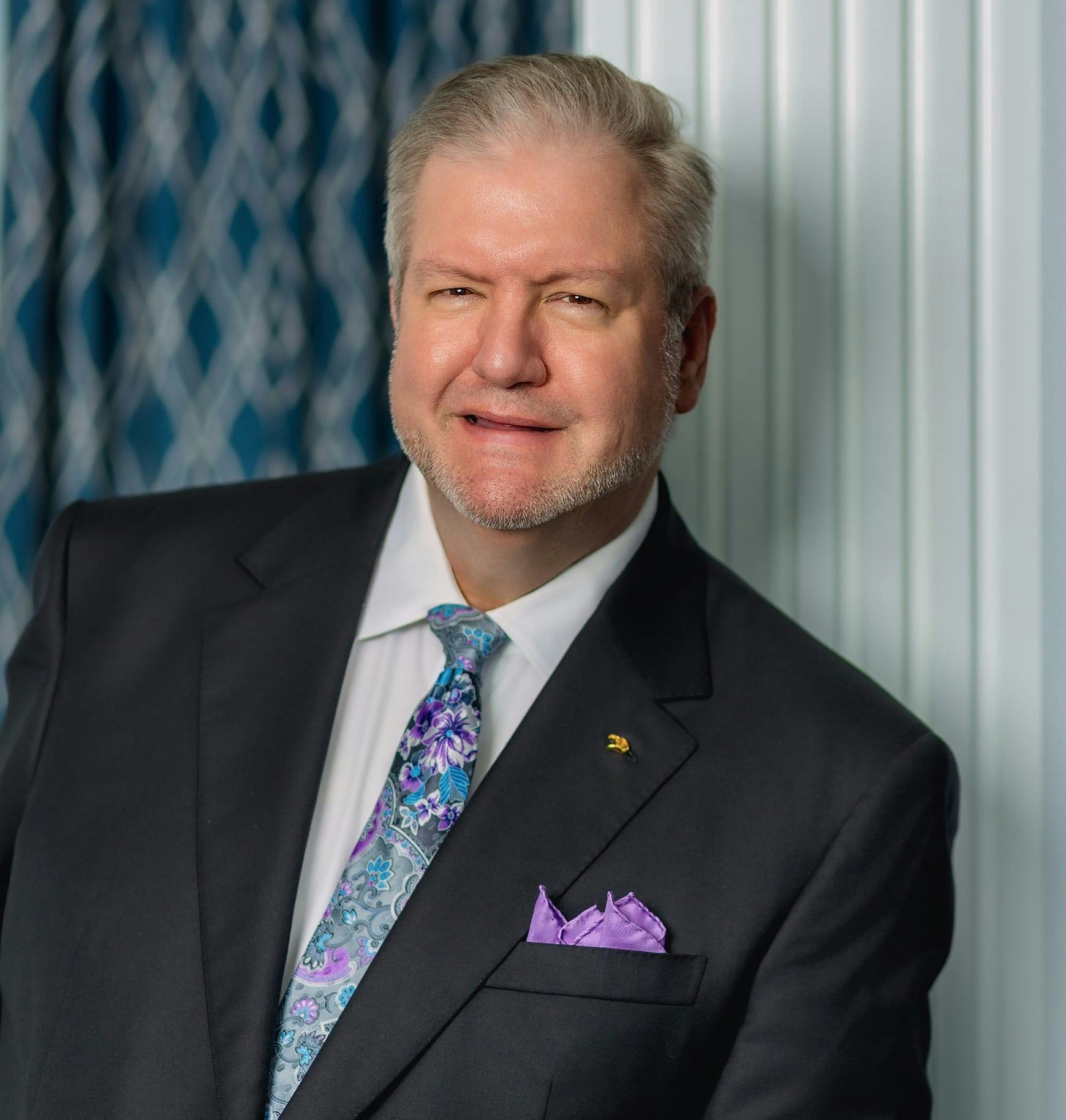 Dr. J David Holcomb