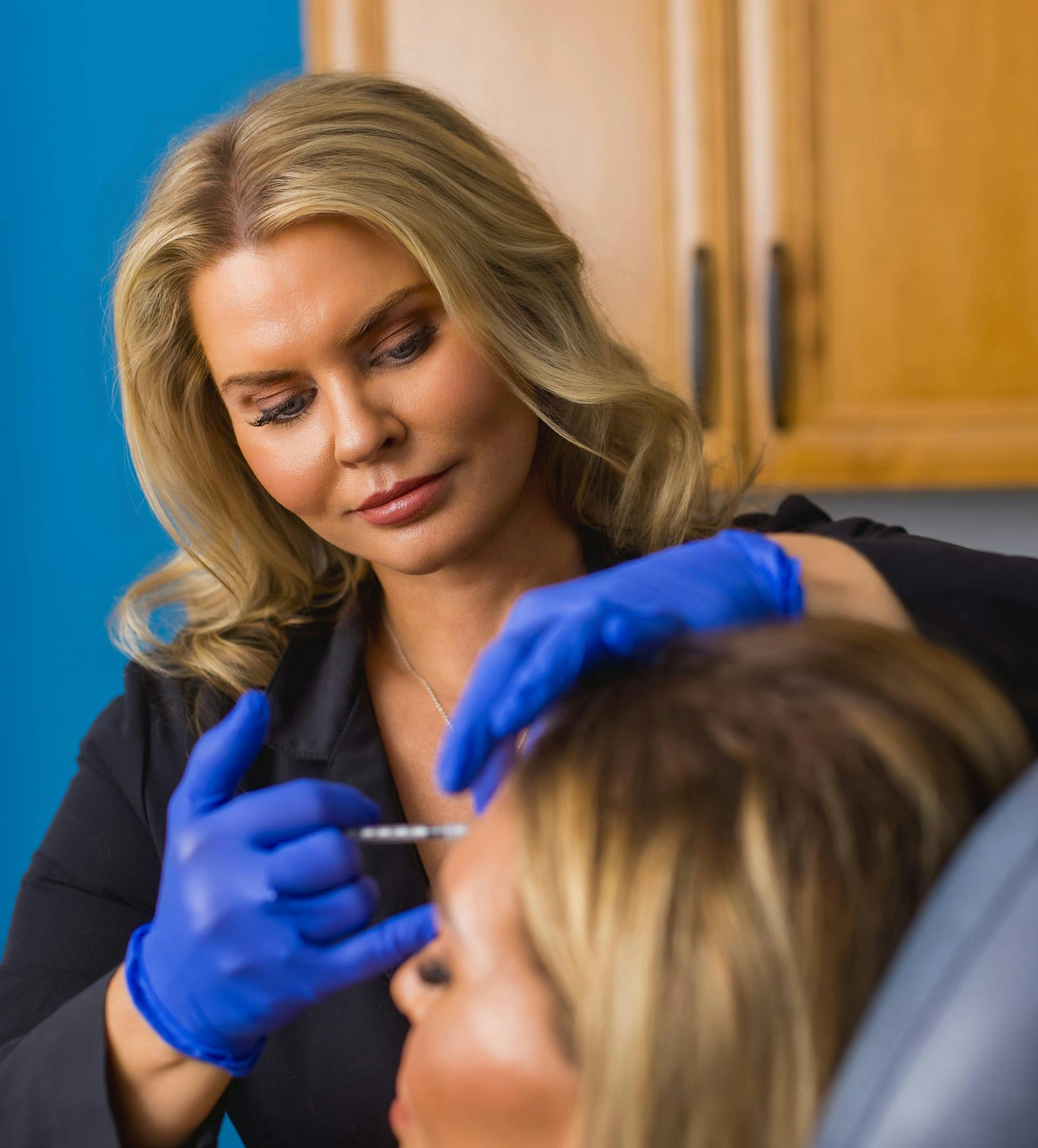Nurse giving a patient injections