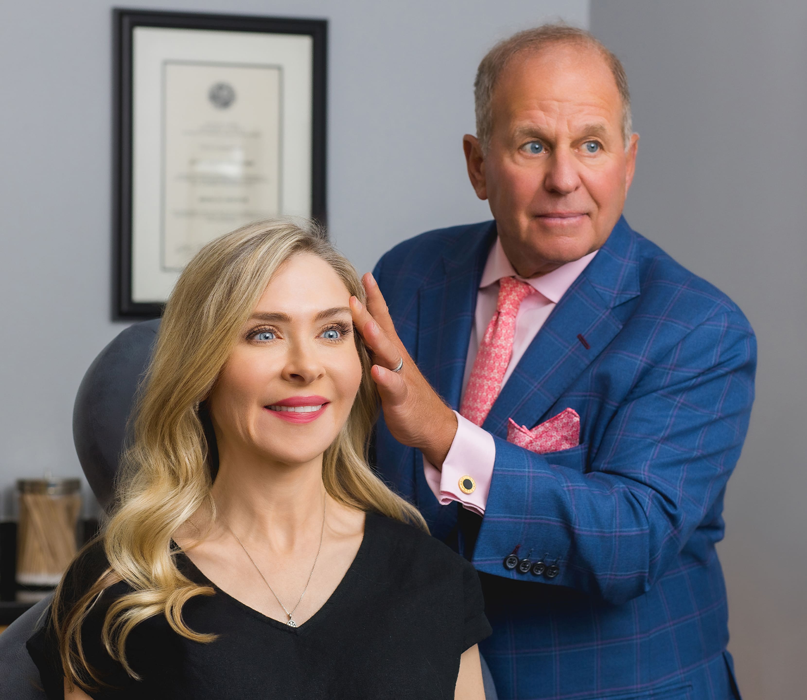 Dr. Salzman looking at patient's face
