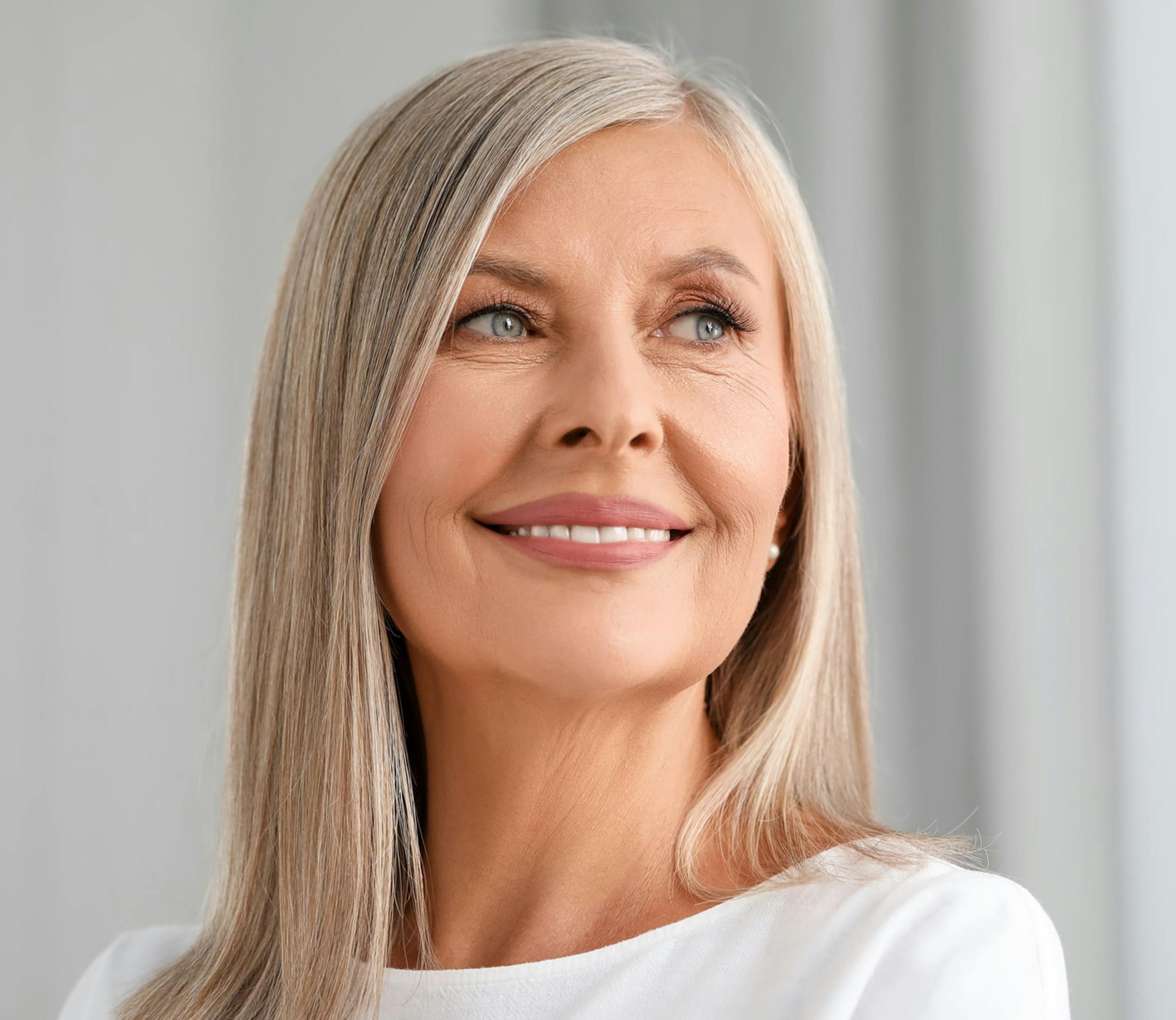 woman with gray hair smiling