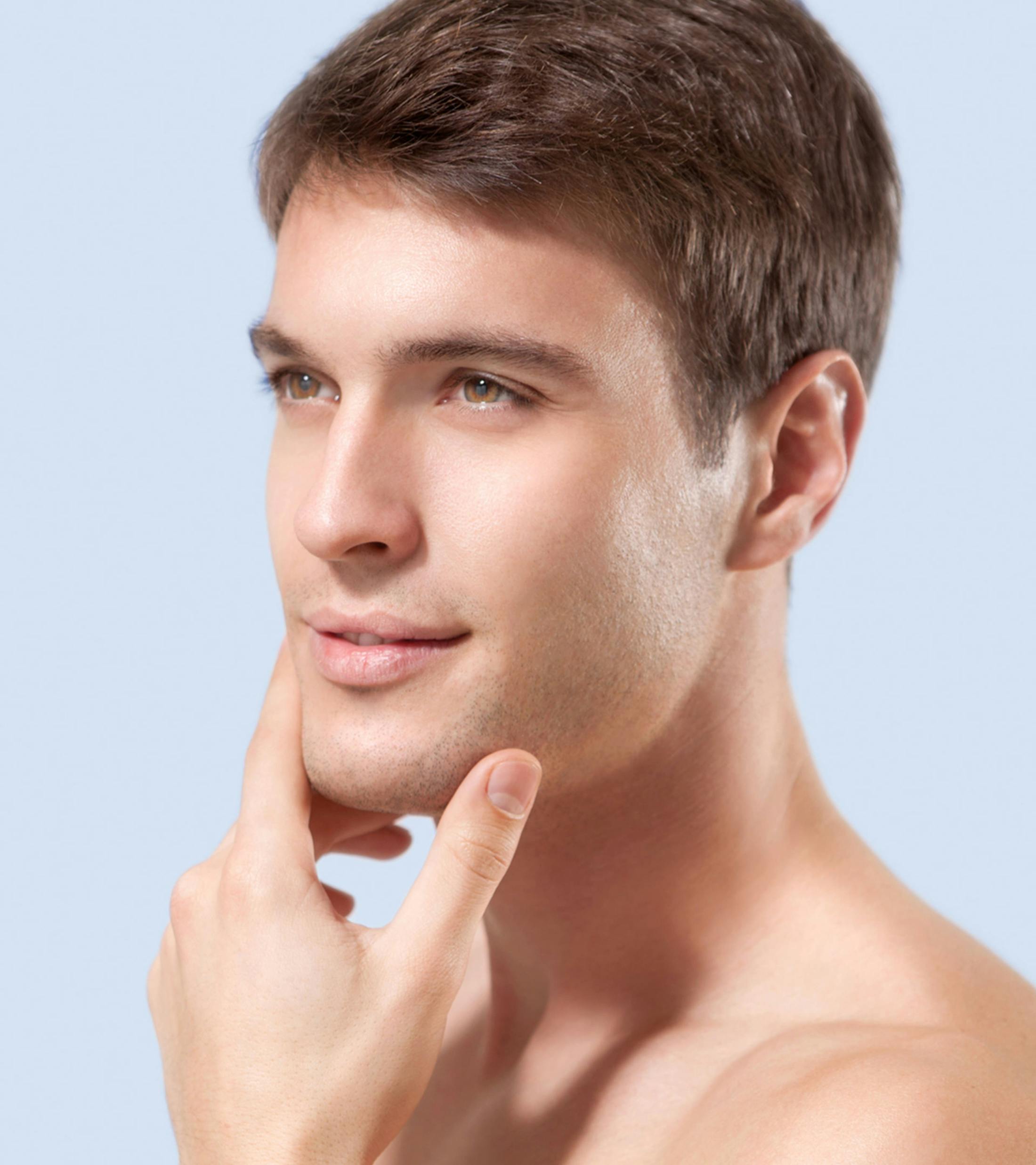 man touching his chin