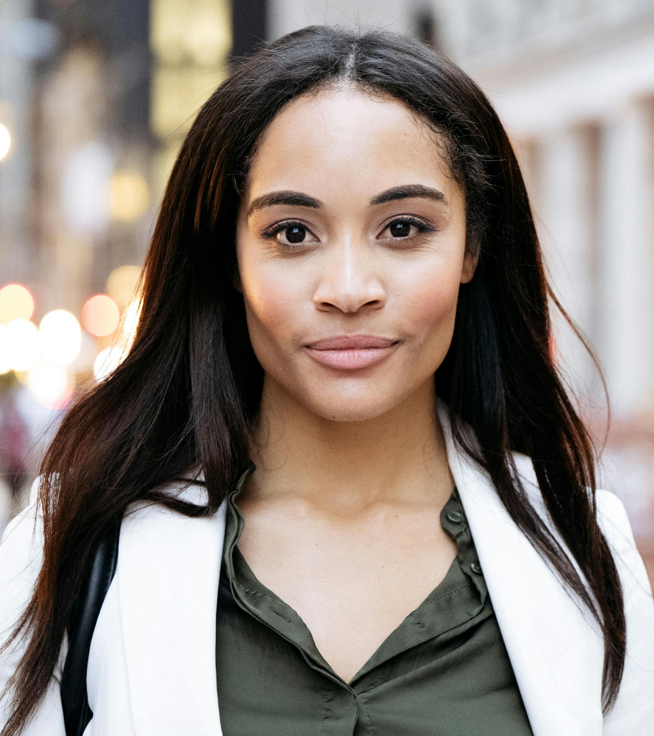 woman looking forward while being outside