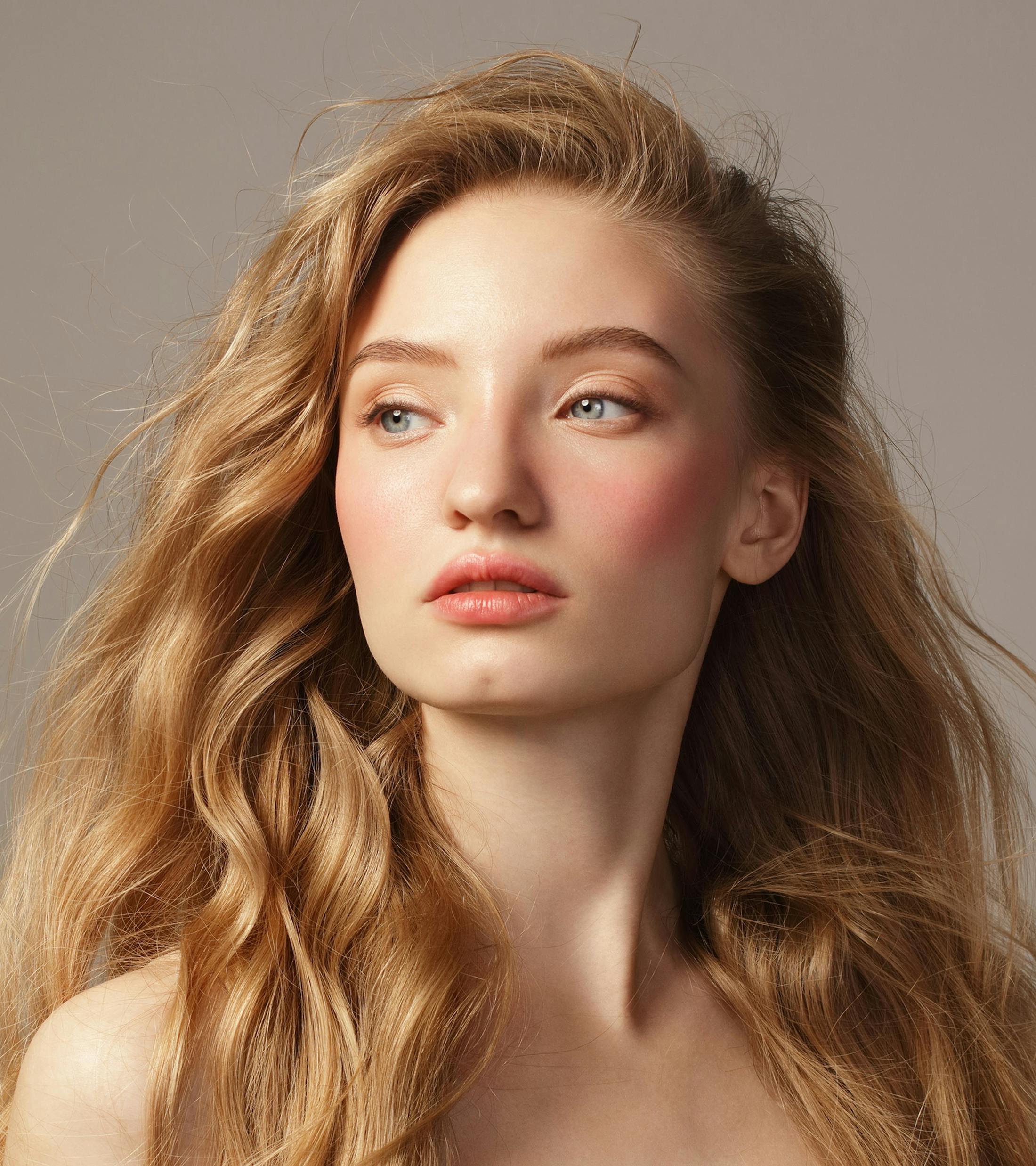 blonde woman looking off to the side