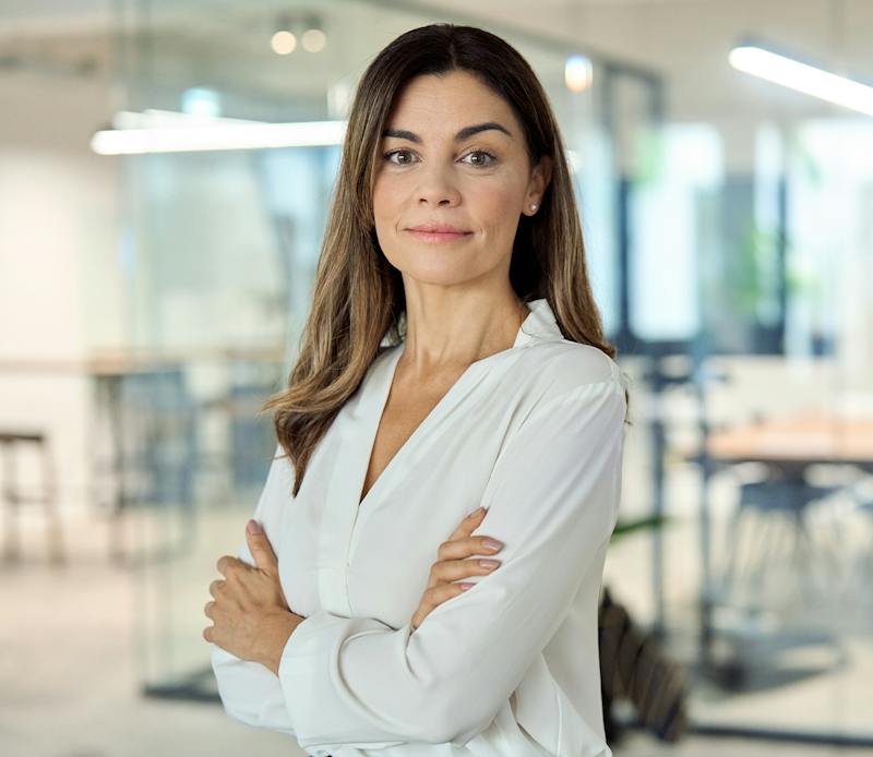 Woman Posing with Her Arms Crossed