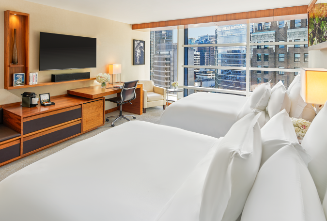 hotel room with queen sized beds