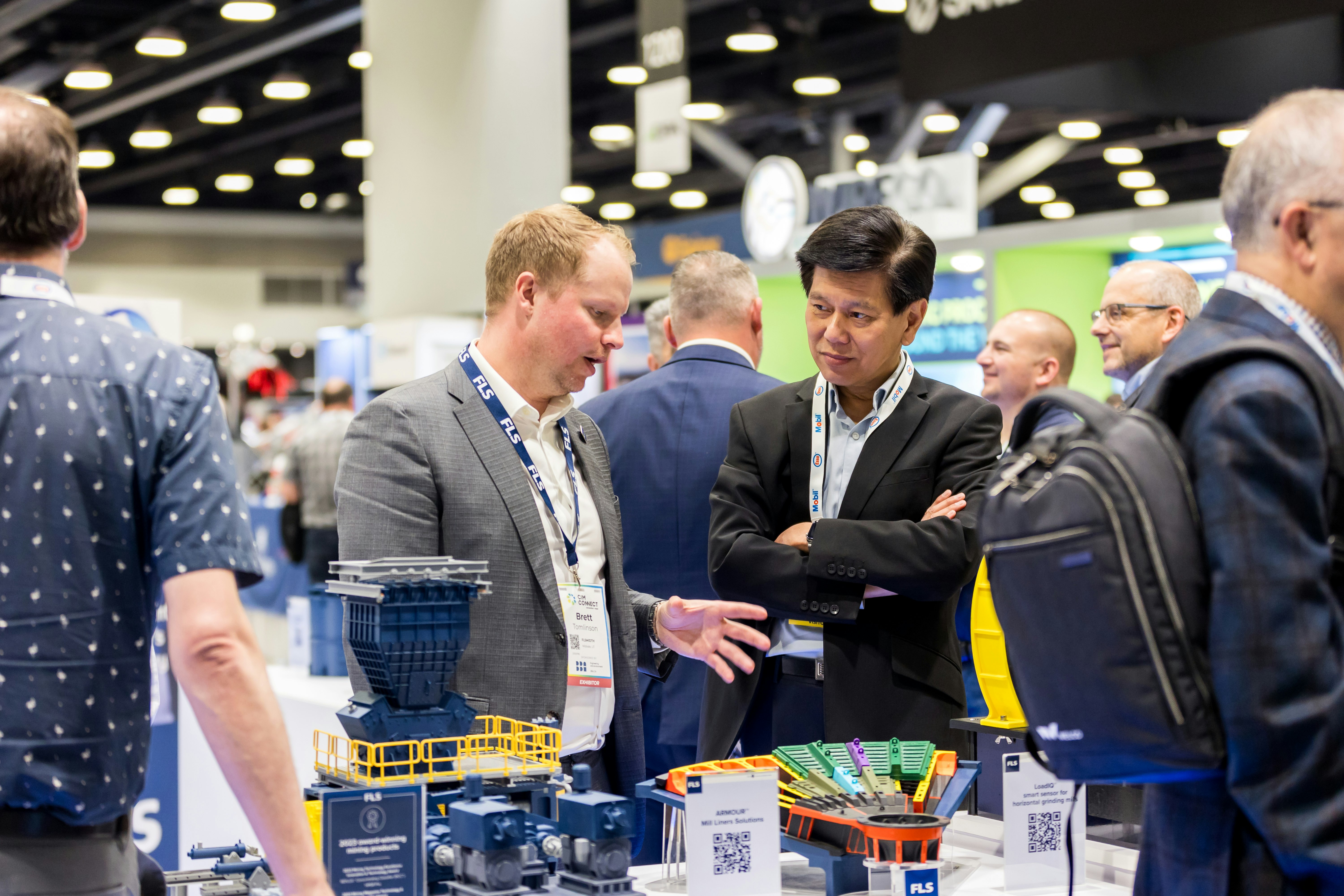 Attendees having conversation