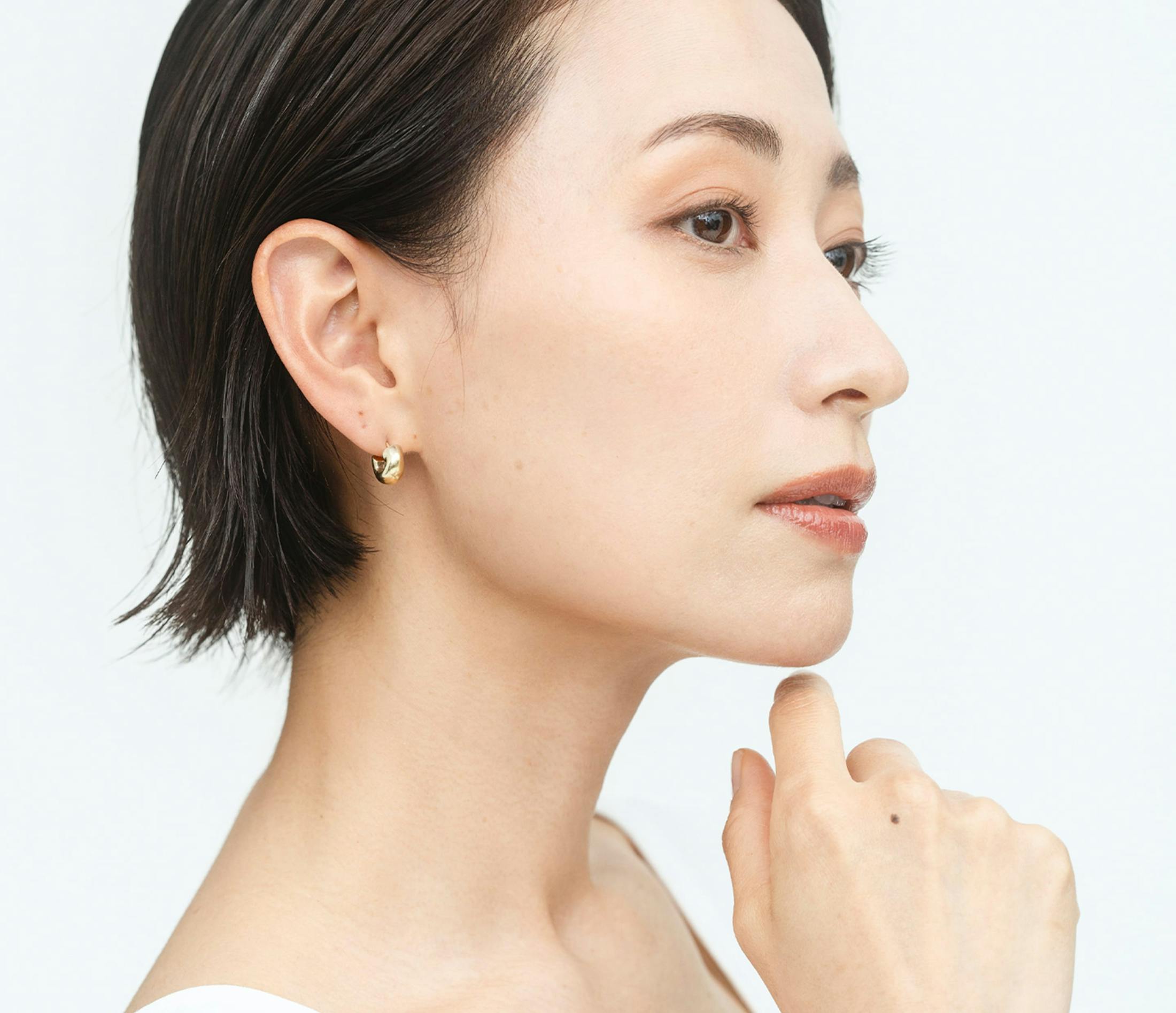 woman with hand on her chin