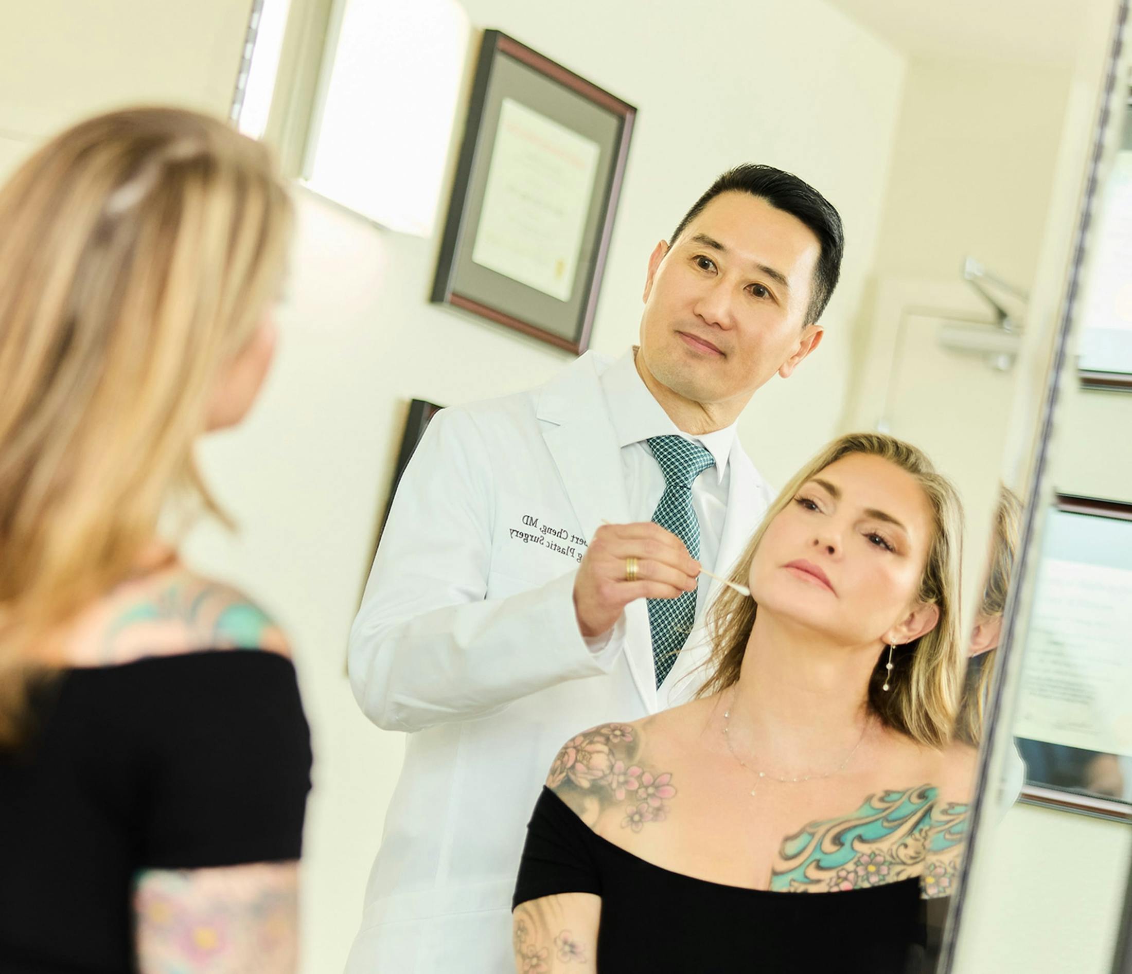 doctor inspecting patient's face