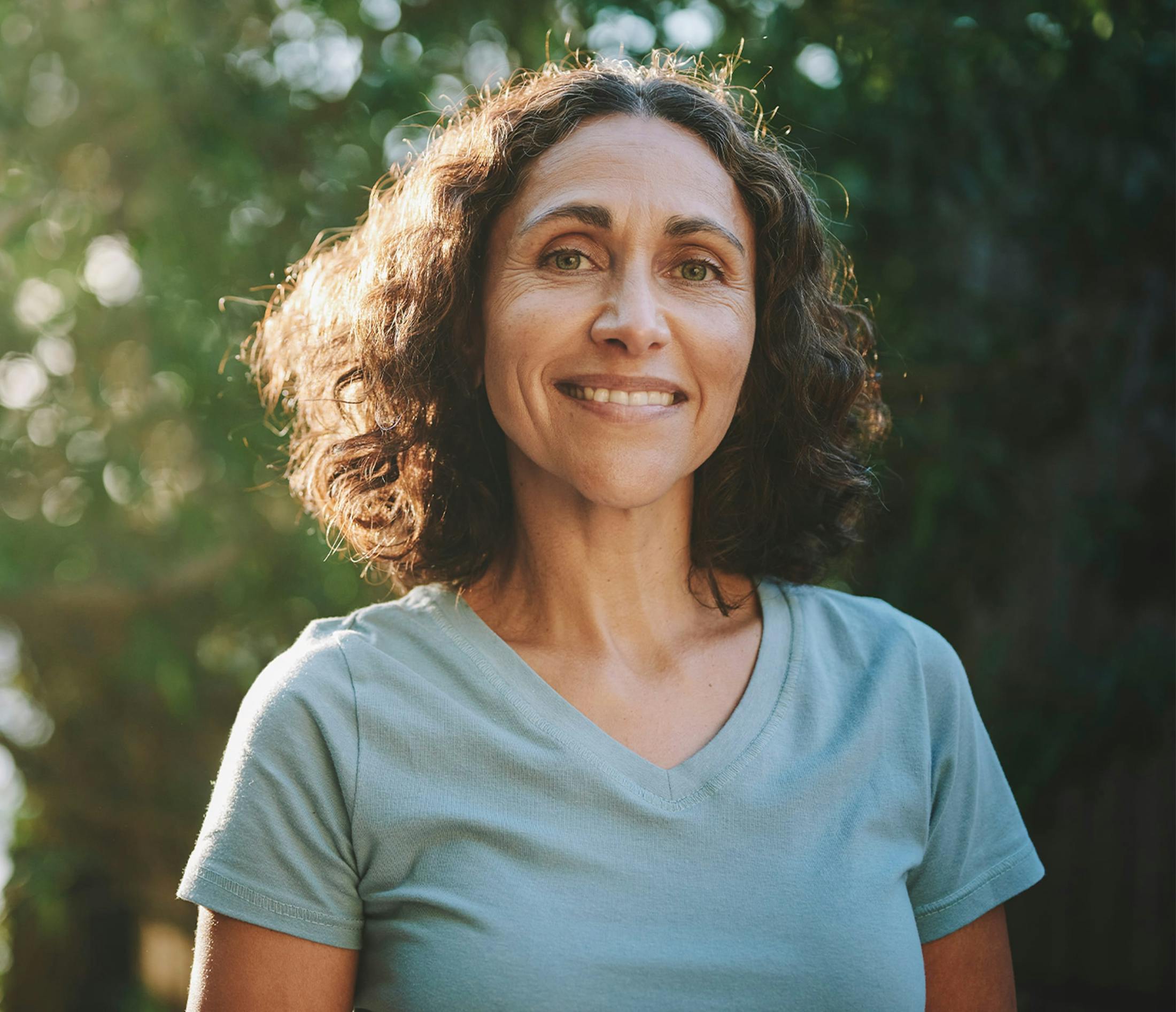 Woman smiling outdoors