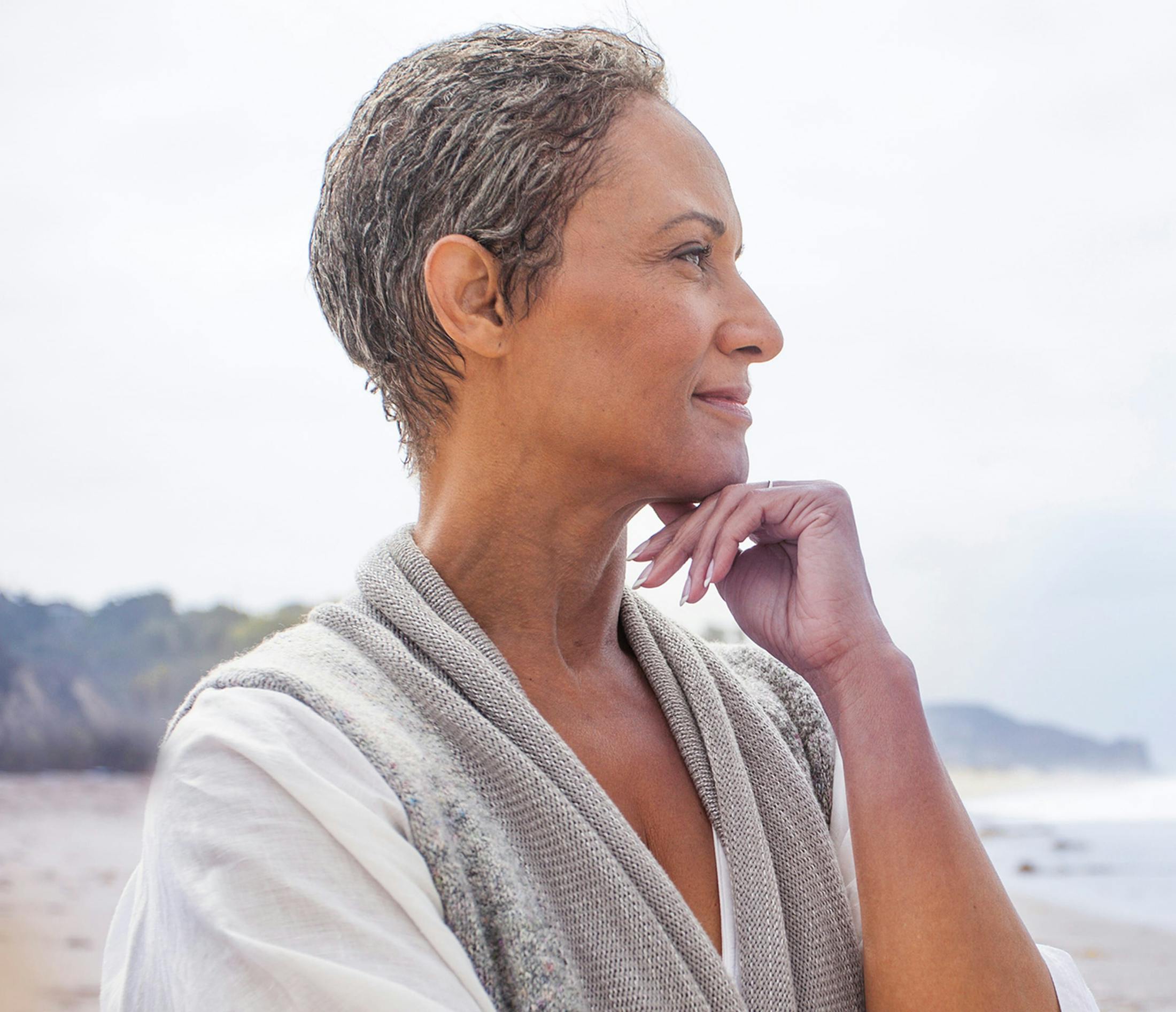 woman on beach smiling
