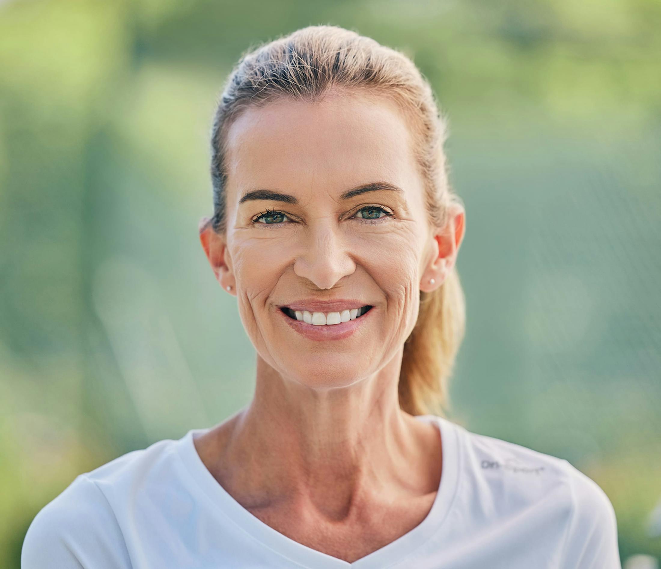 woman smiling outside