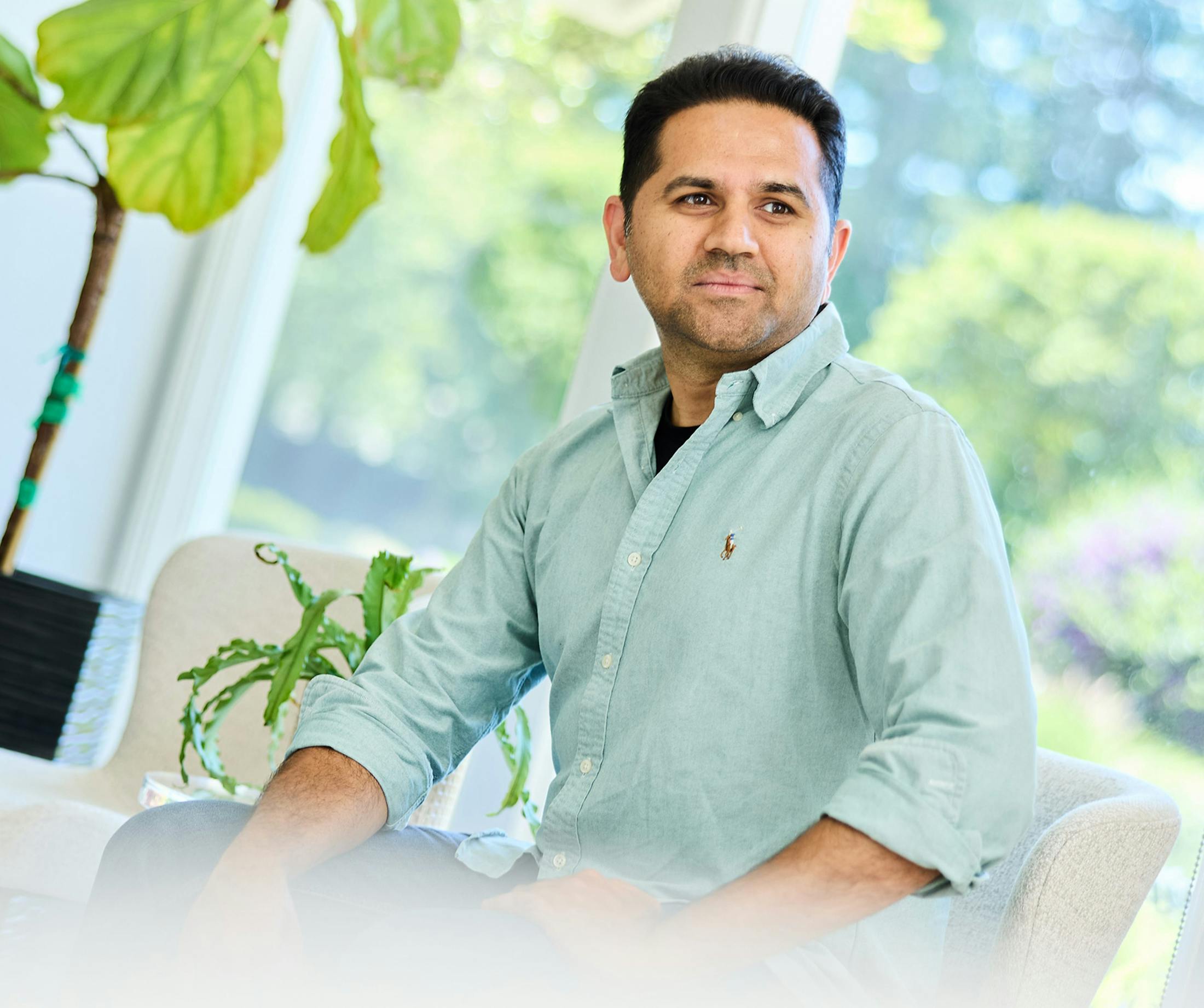 man sitting on couch