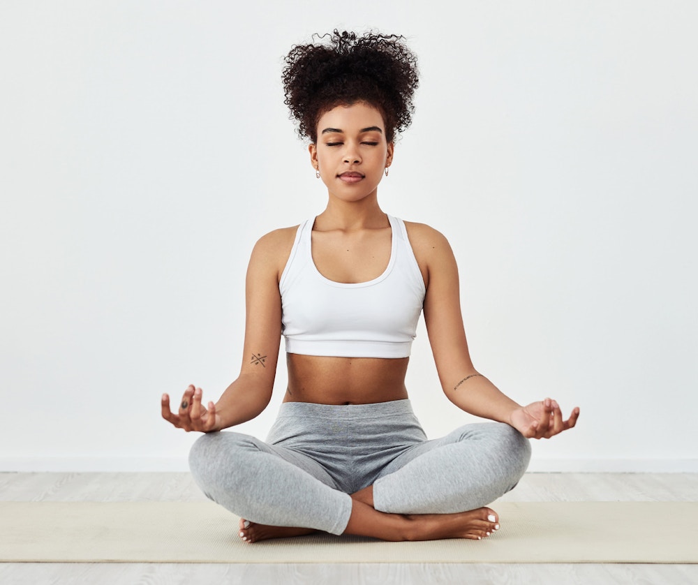 woman sitting cross legged