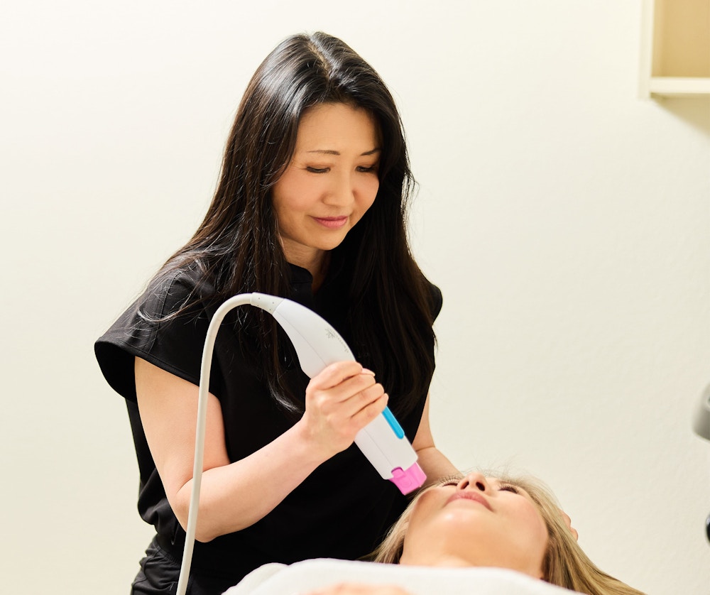 female doctor tending to patient