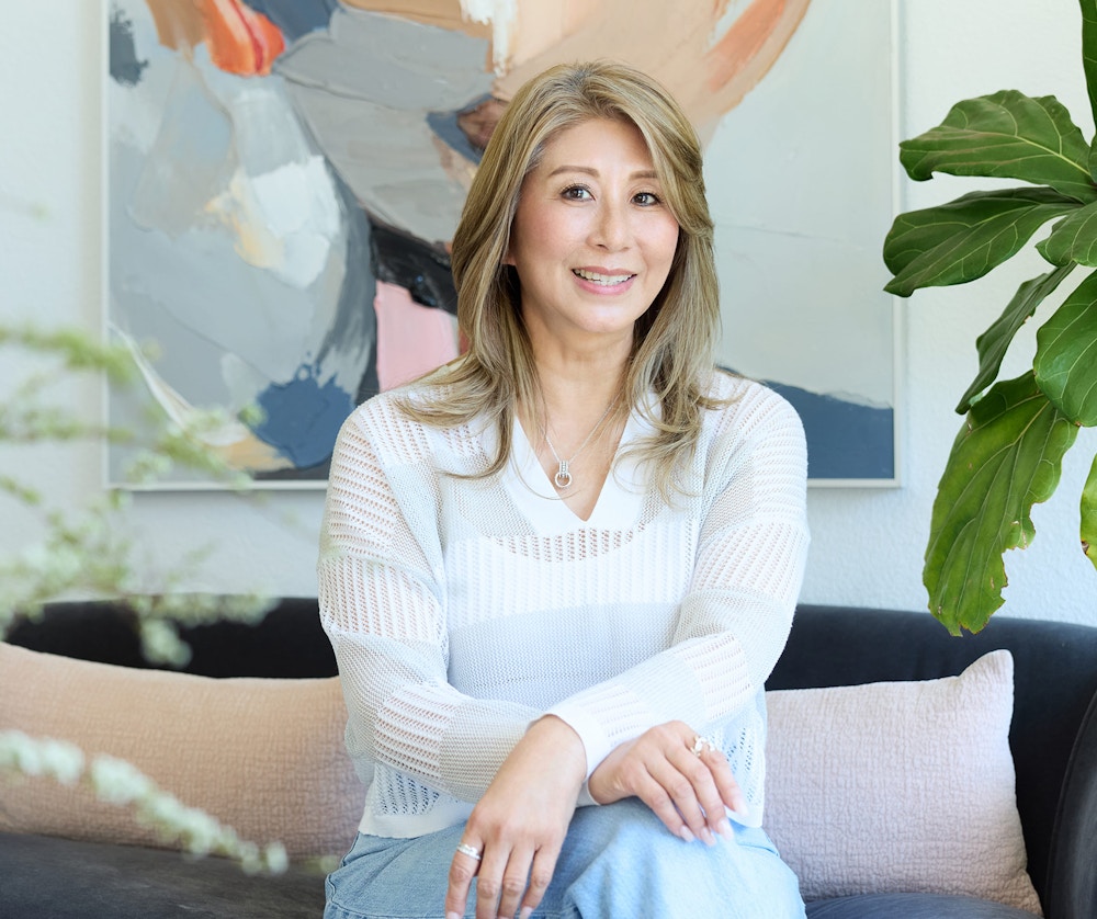 woman sitting on couch