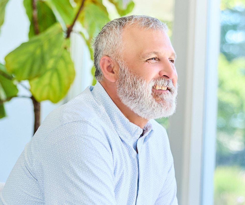 older man smiling