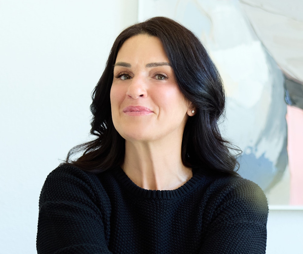 dark hair woman smiling