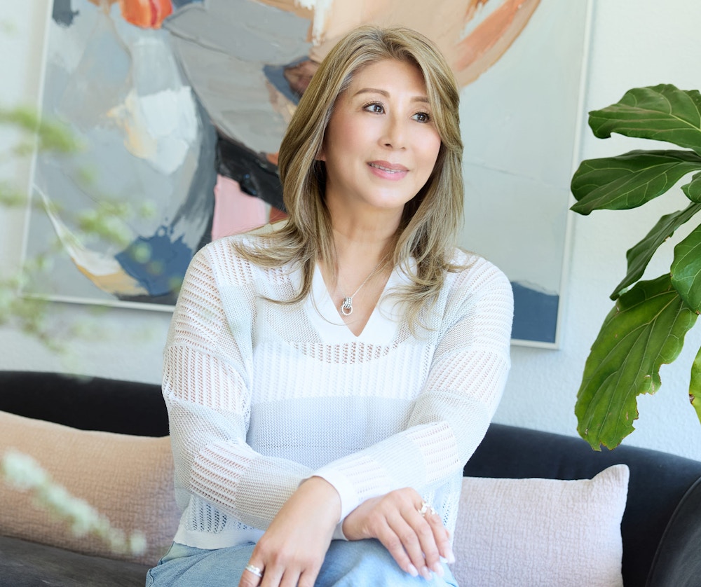 woman sitting on couch