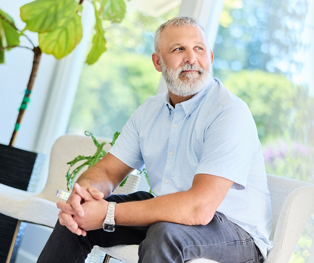 man in a light blue shirt