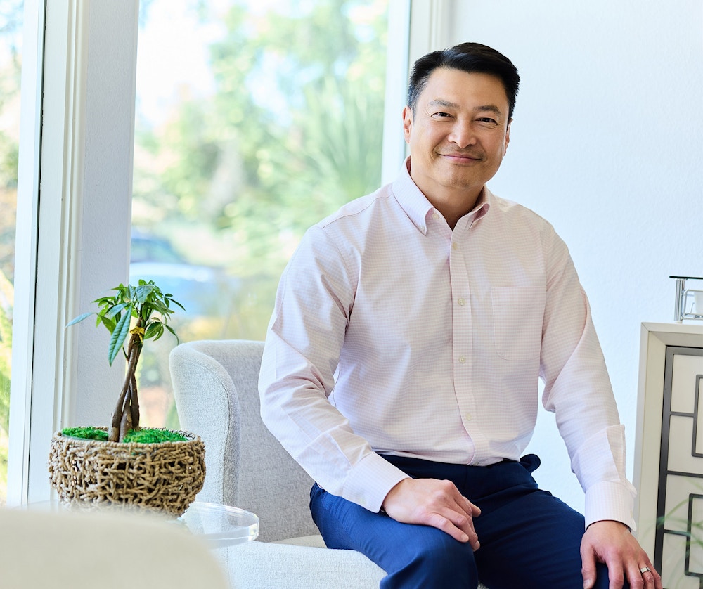 man in a long sleeve white top