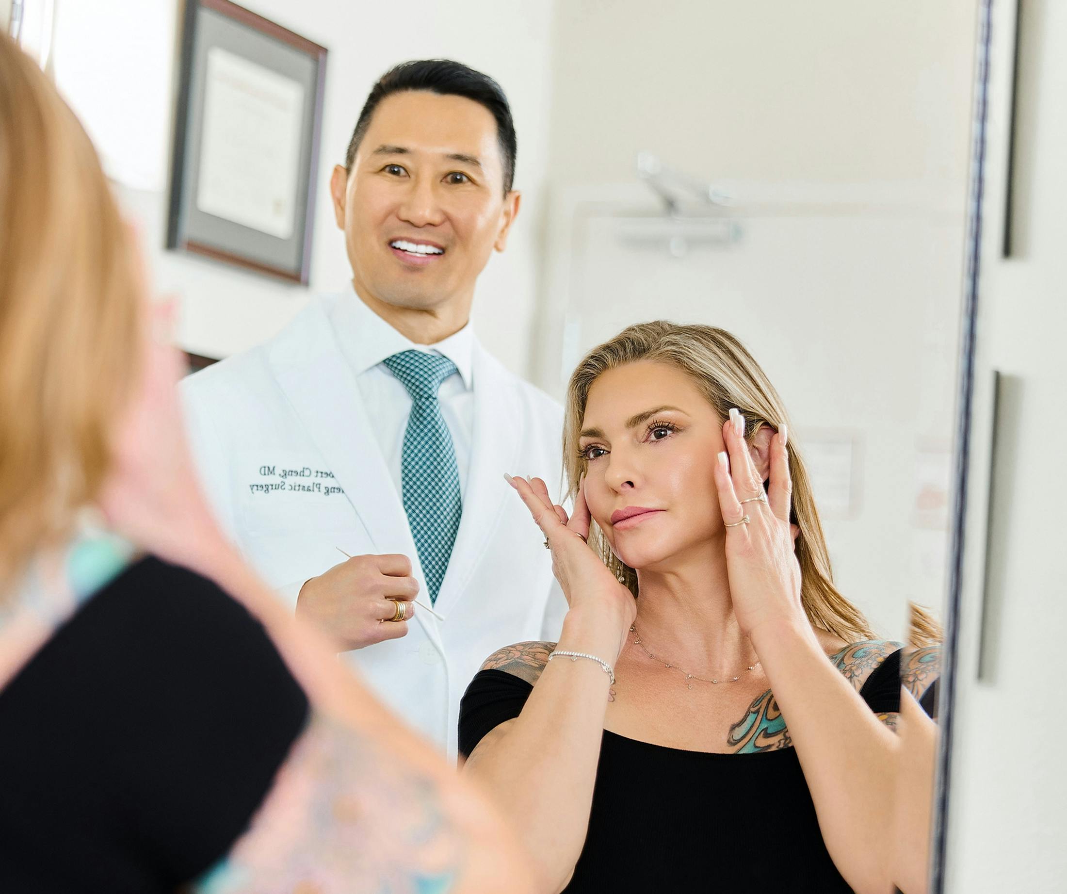 woman looking at herself in a mirror