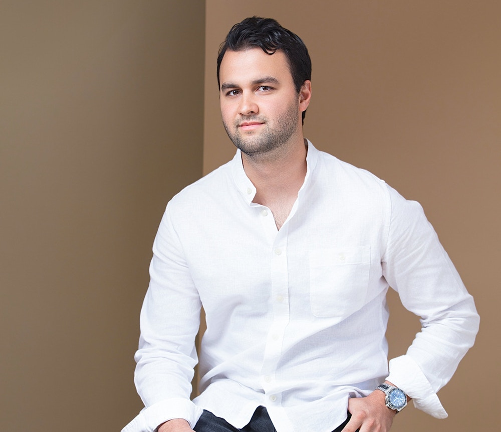 man in a white button up shirt