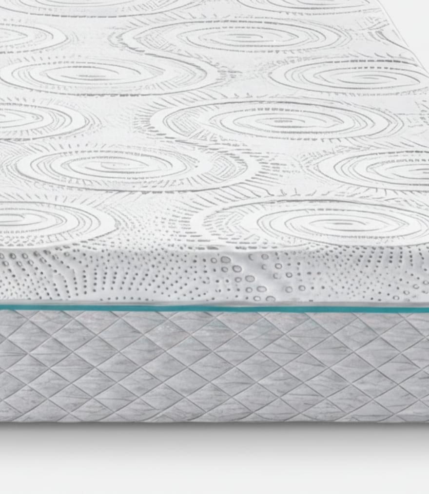 Materasso con rivestimento bianco decorato da cerchi concentrici e base grigia a motivo incrociato.