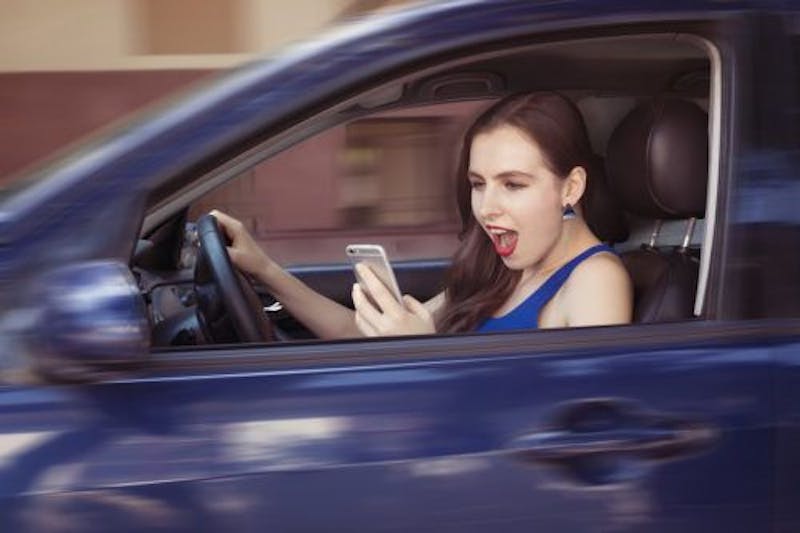 Woman on Phone Driving