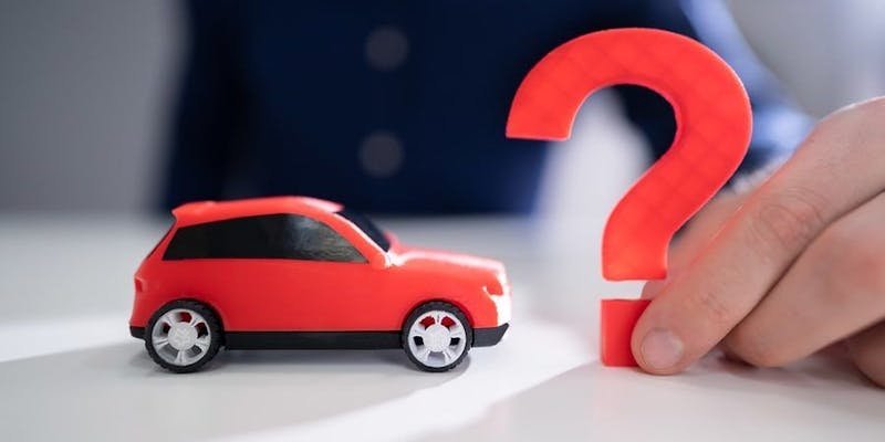 red car and question mark