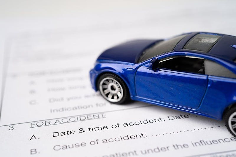 Toy car on a piece of paper