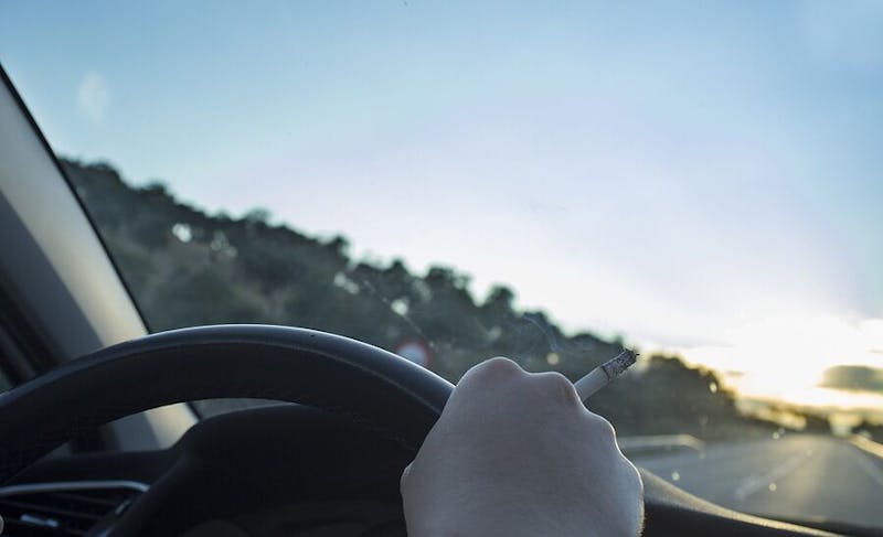 hands on a sterring wheel