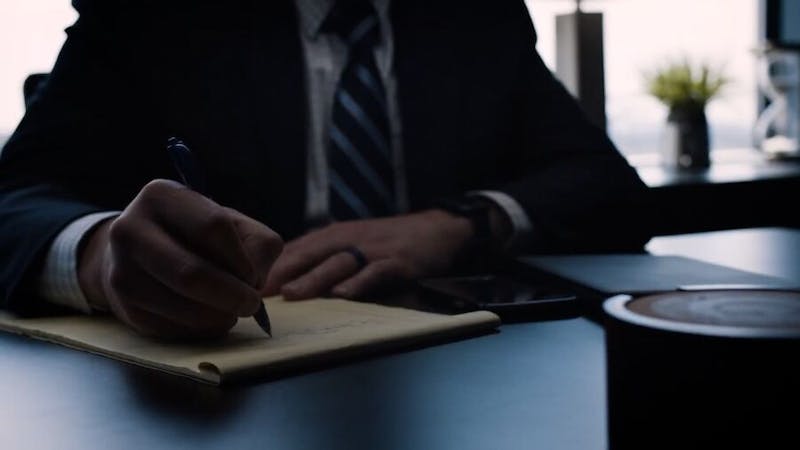 lawyer with paper and pen