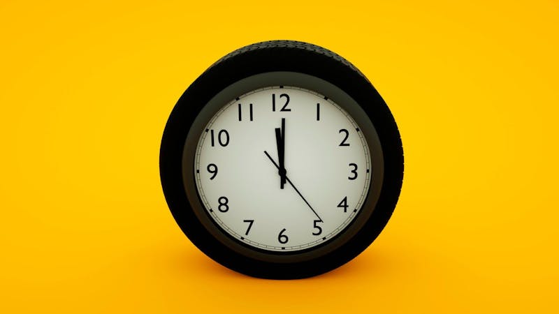 clock on yellow background