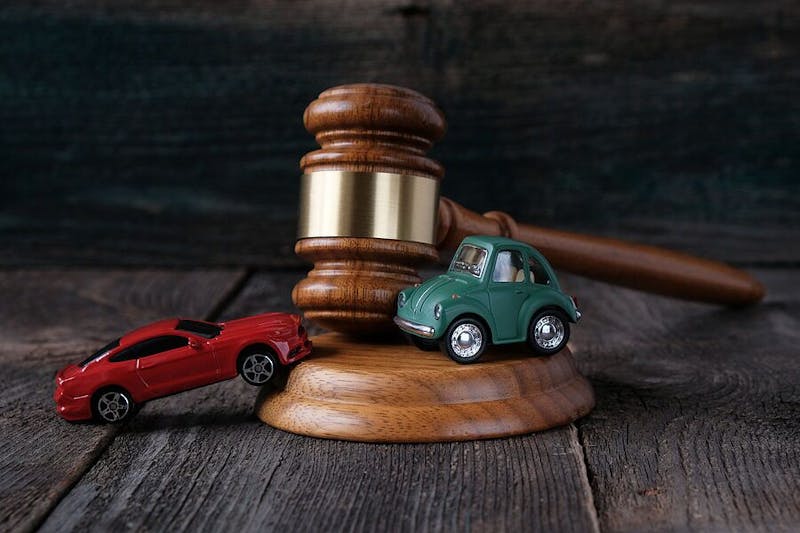 Gavel with Toy Cars