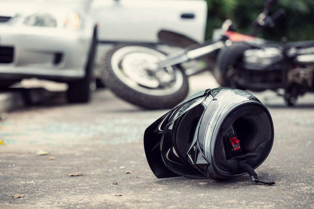 Motorcycle helmet on the ground