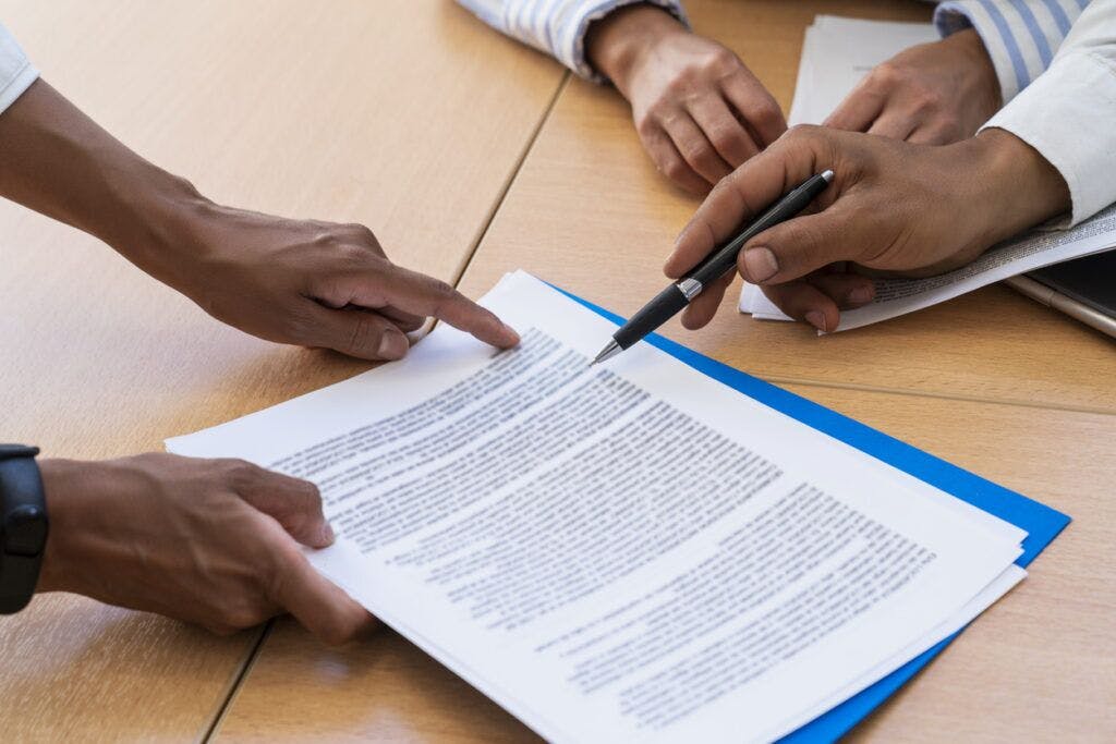 People looking at a piece of paper